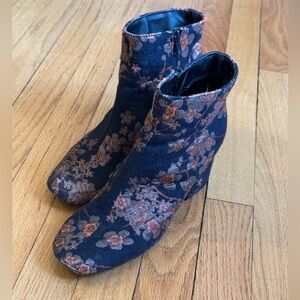 Floral embroidered boots with 2.75inch heel. Cool way to dress up an outfit.